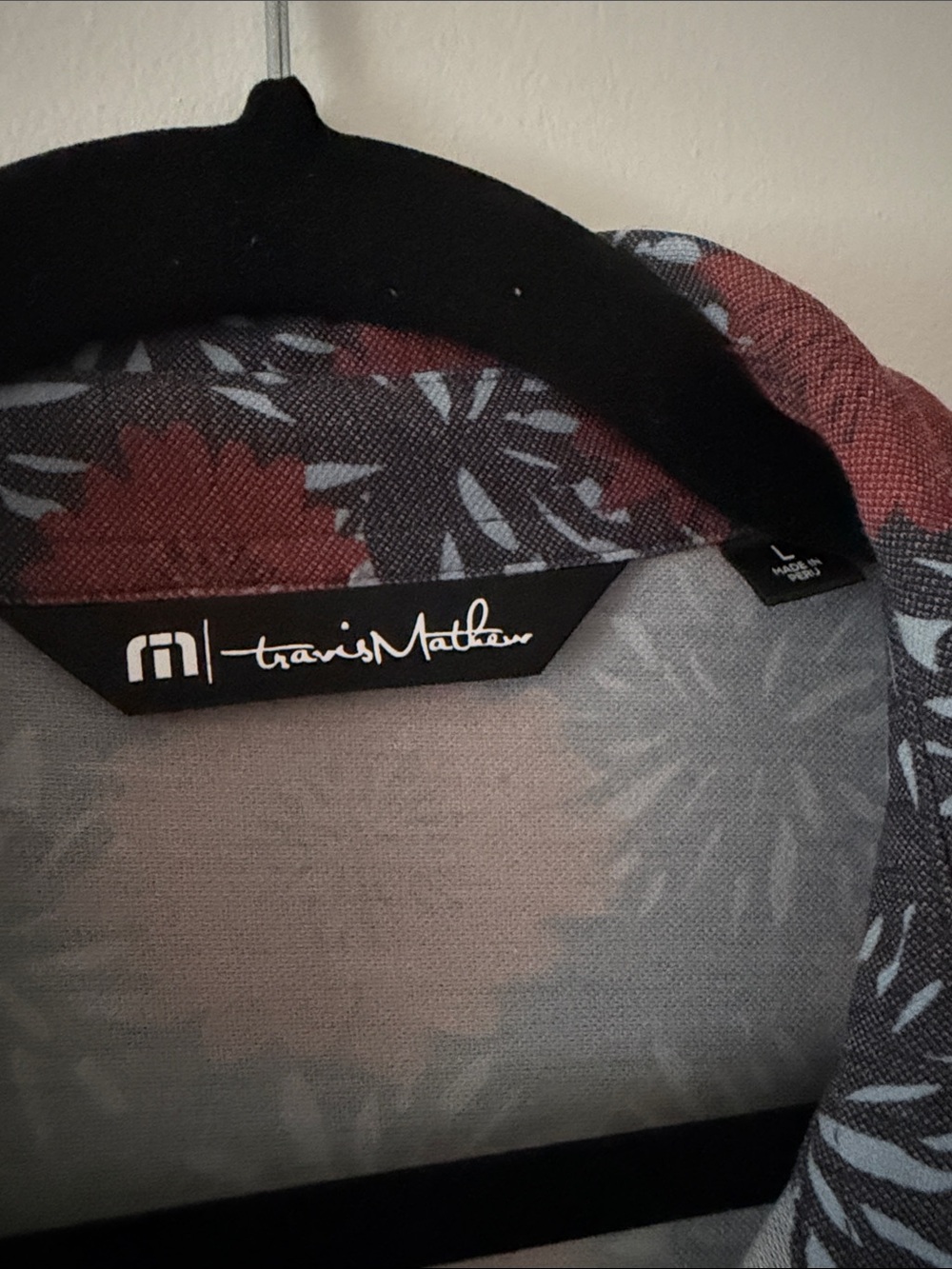 Travis Mathew Golf Polo with Rust Floral Print - Picture 2 of 4